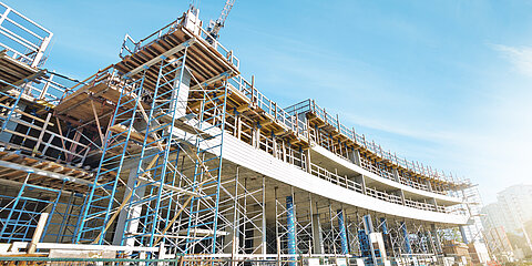 View of a large construction site with crane