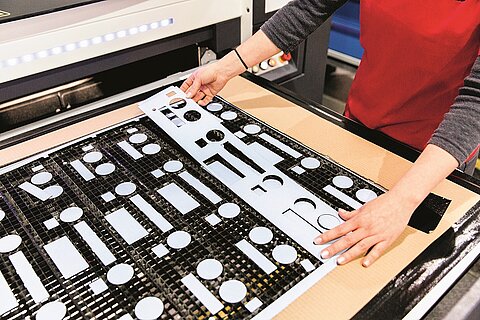 Die-cut parts for gluing the control panel of an oven