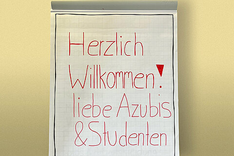 Flipchart with welcome greeting to the apprentices and students