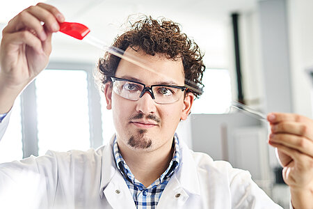 Picture of an employee during quality inspection