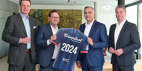 Representatives of Coroplast Tape and the Bergischer Handball Club 06 present the jersey featuring Coroplast Tape’s logo